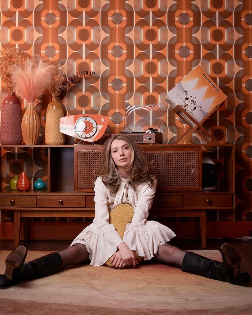 Model Elena Koshka went viral after revealing she fled a hotel when her date’s wife called, only to get a call later from the manager about a forgotten bag of sex toys.