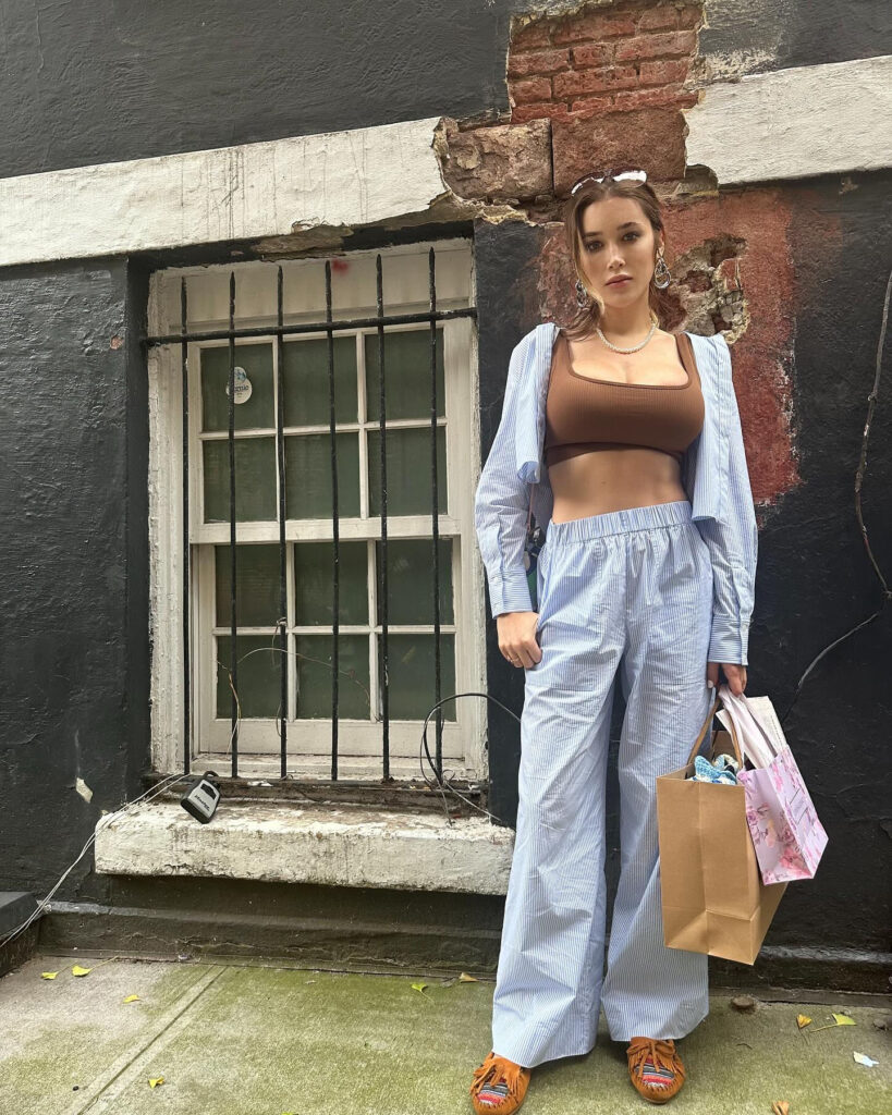 Millionaire model Lana Madison lives simply despite her wealth, renting homes, driving a Porsche, and shopping at Aldi and Goodwill while staying true to her humble roots.