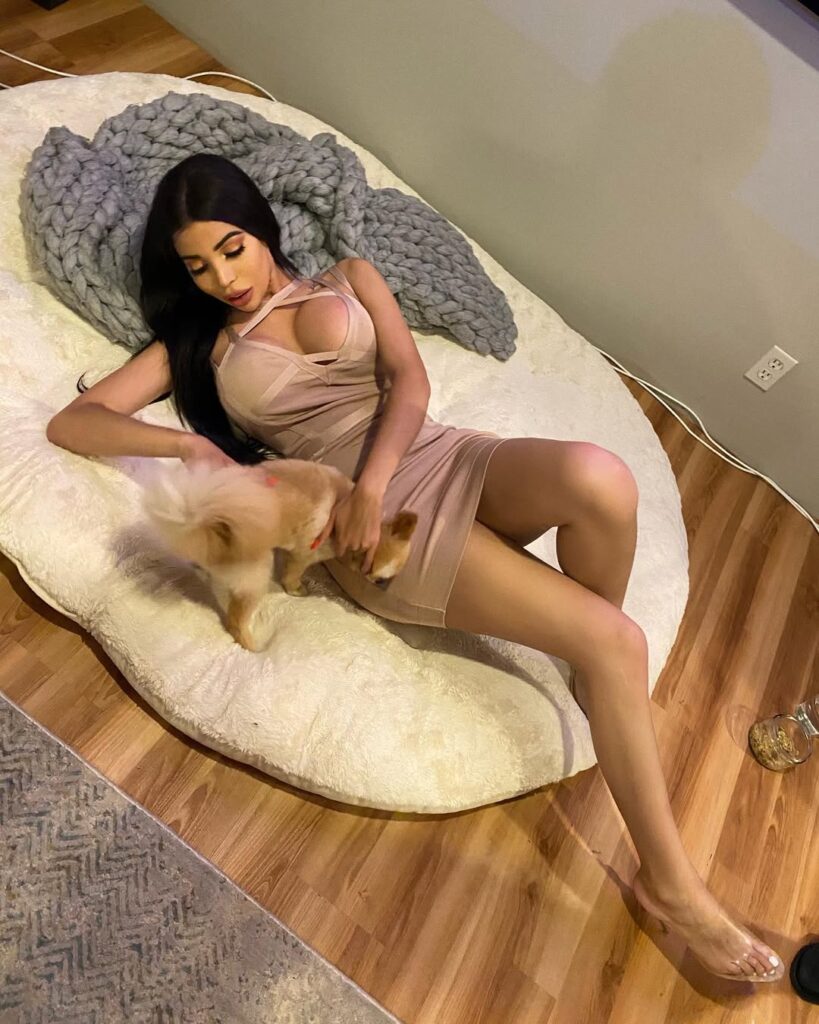 Asian elephants at Whipsnade Zoo cool off in their private pool during the UK heatwave, delighting zookeepers as they splash, swim, and enjoy a refreshing hose-down.