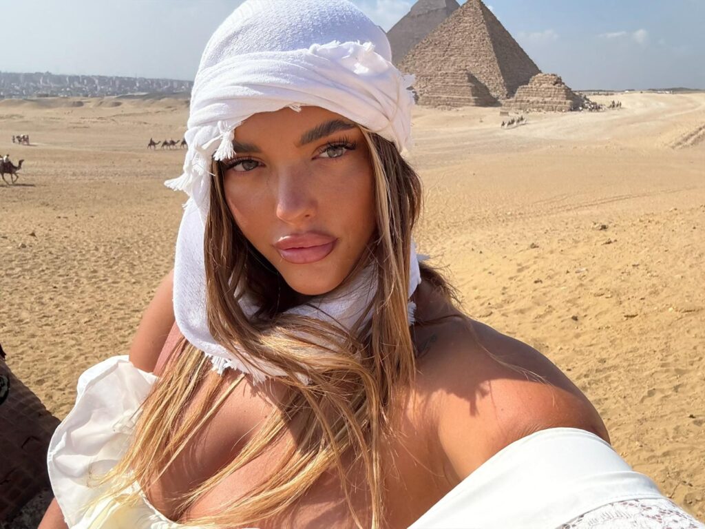 Former flight attendant Alanna Pow dubbed the sexy Dora the Explorer travels first class to the Seven Wonders of the World earning over £110000 a month from her racy career.
