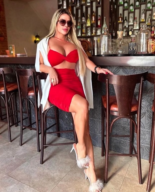 Ex-lawyer turned model Denise Rocha stuns fans with racy witch and devil Halloween looks, complete with a pumpkin and stripper pole, earning thousands of likes online.