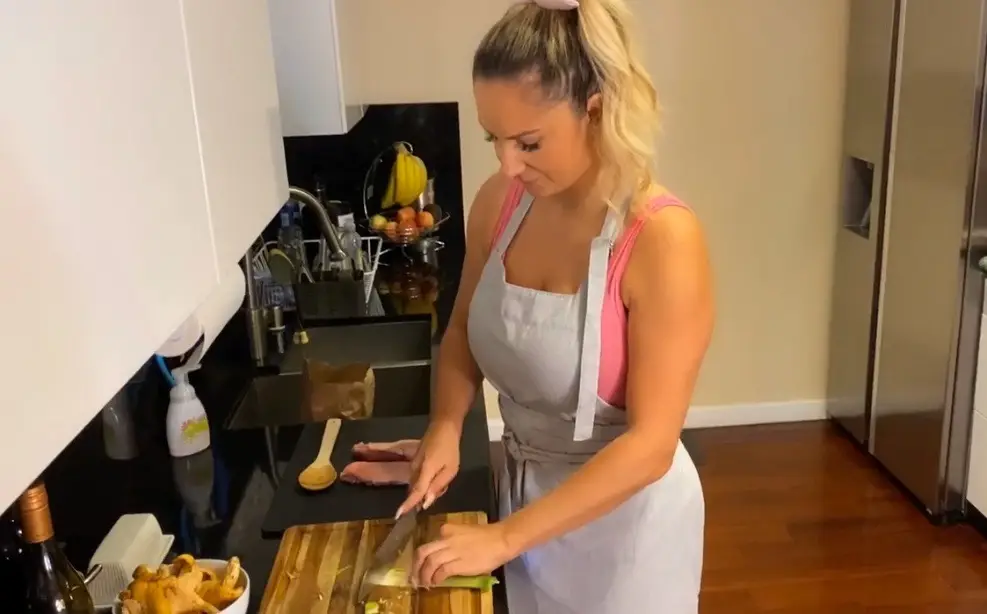 Monica Huldt cooking for her husband - NudeNewz