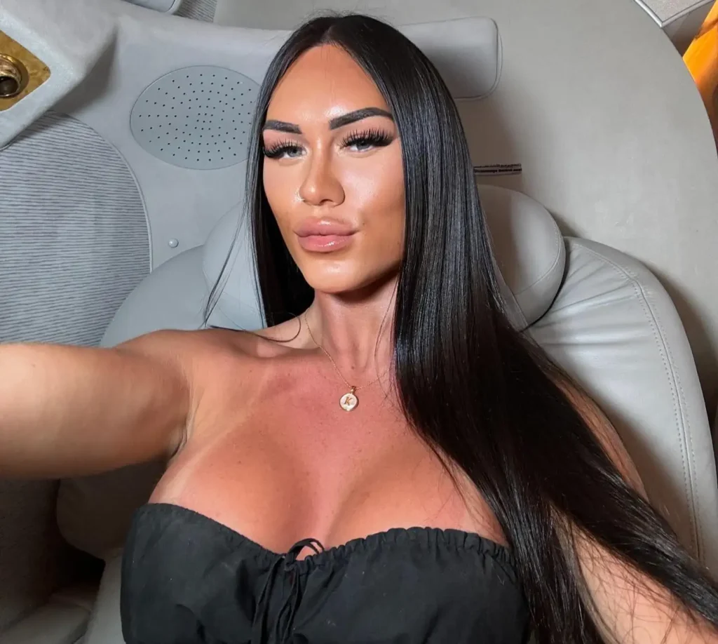 Adult star Kay Manuel posing for a photo.