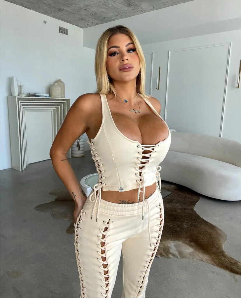 Neyleen Ashley posing for a photo - NudeNewz