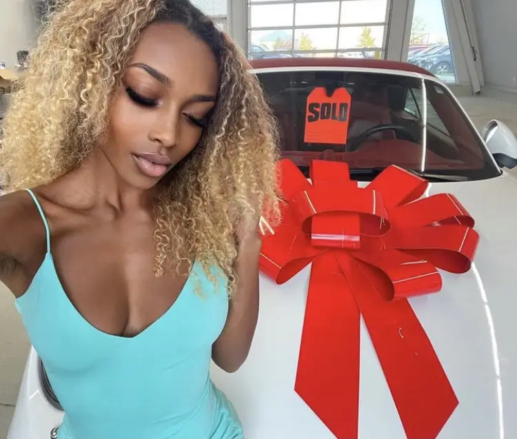 Onlyfans model Sasha Splits in 2021 having bought herself a Porsche 911