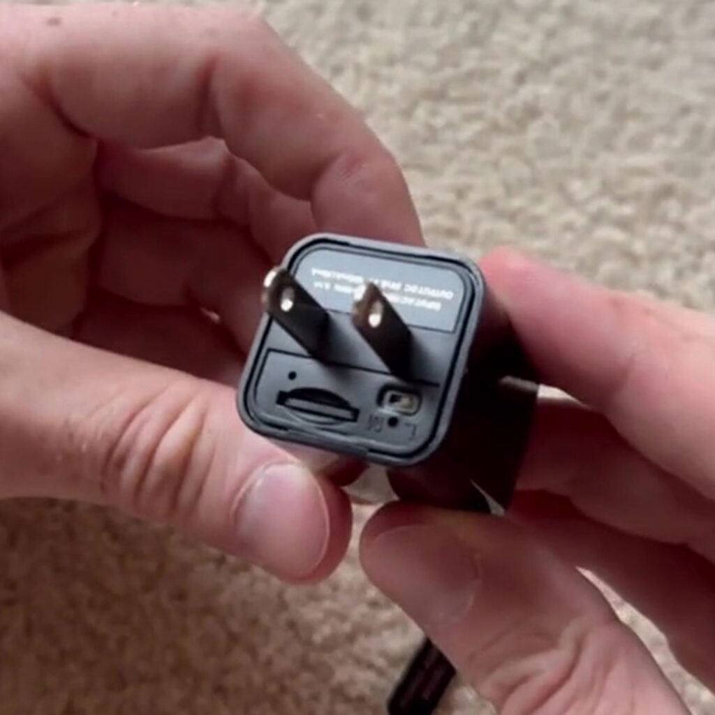 An OnlyFans model says she found a hidden camera disguised as a charger in her holiday rental and shared the footage herself as she and her boyfriend work with police after the discovery.