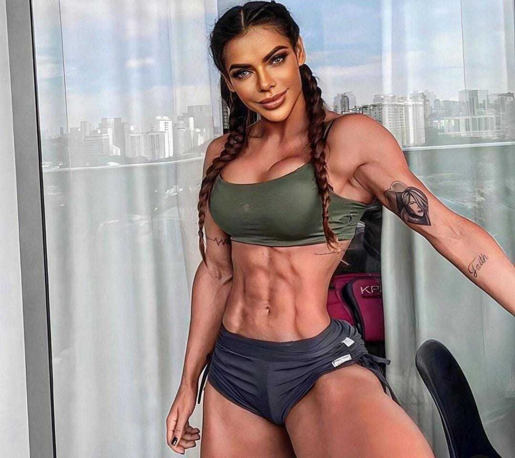 Suzy Cortez shows off extreme strength by pulling a two-tonne truck with her bare hands as part of her intense military-style fitness routine.